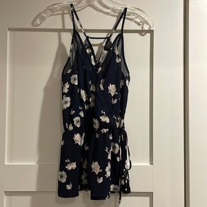 Sienna Sky Floral Tank Top with a cinched waist